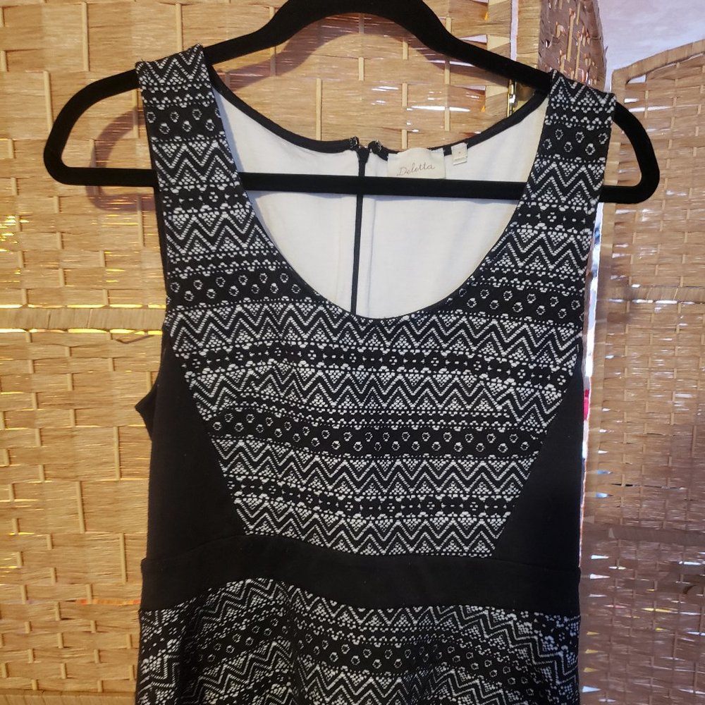 Deletta lace peplum top